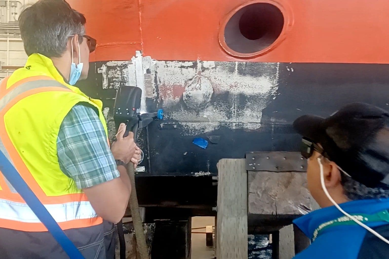 Paint stripping — ship hull